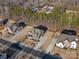 A bird's-eye view of an upscale neighborhood with manicured lawns and beautiful brick homes at 3078 Montreaux Valley Dr, Fort Mill, SC 29707
