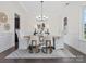 Elegant dining room with stylish lighting, modern decor, and hardwood floors at 3078 Montreaux Valley Dr, Fort Mill, SC 29707
