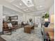 Spacious living room featuring coffered ceilings and open floor plan at 3078 Montreaux Valley Dr, Fort Mill, SC 29707