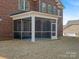 Spacious screened porch offering a comfortable outdoor living area with privacy and protection from the elements at 3078 Montreaux Valley Dr, Fort Mill, SC 29707