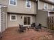 Outdoor backyard deck with seating, enhancing the home's exterior at 3170 Heathstead Pl, Charlotte, NC 28210