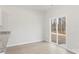 Bright dining area with wood floors and sliding glass door to the backyard at 3267 Maple Ridge Dr, Gastonia, NC 28052