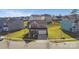 Aerial view of a charming two-story home with a well-manicured lawn and a two-car garage at 3427 Laurel Oak Ln, Gastonia, NC 28056