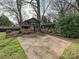 Backyard patio featuring a brick outdoor cooking area at 4132 Sulkirk Rd, Charlotte, NC 28210