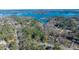 Aerial view of the community featuring waterfront property and lush greenery at 4268 Rustling Woods Dr, Denver, NC 28037