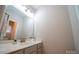 Bathroom features include bright light, white sink and vanity at 4268 Rustling Woods Dr, Denver, NC 28037