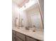 Bathroom with bright light, white sink and vanity at 4268 Rustling Woods Dr, Denver, NC 28037