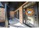 Charming front porch with seasonal wreath on front door, enhancing curb appeal at 4268 Rustling Woods Dr, Denver, NC 28037