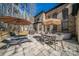 Spacious patio with lounge chairs, dining set, and hot tub, ideal for outdoor entertaining and relaxation at 4268 Rustling Woods Dr, Denver, NC 28037