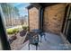 Cozy front porch with outdoor furniture, creating a welcoming and relaxing space at 4268 Rustling Woods Dr, Denver, NC 28037