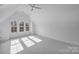Large, bright bedroom with neutral carpet and vaulted ceilings at 5026 Ohm Ln, Charlotte, NC 28270