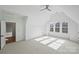 Bright and spacious bedroom with neutral carpet and vaulted ceilings at 5026 Ohm Ln, Charlotte, NC 28270