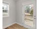 A charming back porch with wooden decking provides a view of the tranquil backyard at 5051 Oxbow Run Ln, York, SC 29710