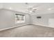 Spacious bedroom features a ceiling fan, window, and neutral color palette at 5051 Oxbow Run Ln, York, SC 29710