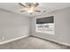 Neutral bedroom with a ceiling fan and a window providing natural light at 5051 Oxbow Run Ln, York, SC 29710