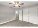 Inviting bedroom showcasing a ceiling fan and closet space at 5051 Oxbow Run Ln, York, SC 29710