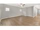 Bright bonus room with wood-look floors and large windows providing lots of natural light at 5051 Oxbow Run Ln, York, SC 29710