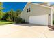 Spacious two-car garage and extra parking space are found along the side of this lovely home at 5051 Oxbow Run Ln, York, SC 29710