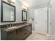 Bathroom features granite countertops and dual sinks at 506 Abbotsford Ct, Charlotte, NC 28270