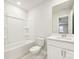 A clean bathroom features a bathtub, toilet and vanity with storage space at 5204 Georgette Trl, Cherryville, NC 28021