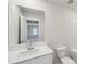 Bathroom featuring a modern vanity with a sink and faucet, mirror, toilet, and shower/tub combo at 5207 Georgette Trl, Cherryville, NC 28021
