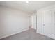 Bedroom featuring neutral walls, plush carpet, and a door to the closet and hall at 5207 Georgette Trl, Cherryville, NC 28021