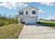 New construction home featuring a spacious driveway leading to a two-car garage and a well-manicured lawn at 5207 Georgette Trl, Cherryville, NC 28021