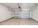 Spacious two-car garage with ample storage space and a functional garage door opener at 5207 Georgette Trl, Cherryville, NC 28021