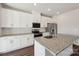 Kitchen with ample counter space, stainless appliances, and white cabinetry at 5207 Georgette Trl, Cherryville, NC 28021