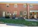 Exterior of home, with brick facade and small yard at 623 S New Hope Rd # 4, Gastonia, NC 28054