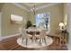 Formal dining room with chandelier and large window at 8034 Bay Pointe Dr, Denver, NC 28037