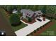 Charming two-story home with stone accents, an attached two-car garage, and well manicured landscaping at 8034 Bay Pointe Dr, Denver, NC 28037