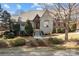 Beautiful stone home with a manicured front yard and mature trees at 8034 Bay Pointe Dr, Denver, NC 28037