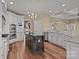 Bright kitchen with an island, stainless steel appliances, and plenty of counter space at 8034 Bay Pointe Dr, Denver, NC 28037