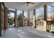 Covered porch with wood flooring and a view of the backyard at 8034 Bay Pointe Dr, Denver, NC 28037