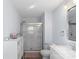 Clean bathroom with a shower, toilet and a large vanity, complemented by natural light at 1016 Helms Rd, Charlotte, NC 28214