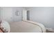 Inviting bedroom with warm tones and a soft throw, exuding coziness and comfort at 1016 Helms Rd, Charlotte, NC 28214