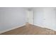 A minimalistic bedroom with two entrances at 1016 Helms Rd, Charlotte, NC 28214