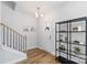Welcoming entryway with staircase, stylish decor, and hardwood floors, creating a great first impression at 1016 Helms Rd, Charlotte, NC 28214