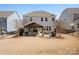 Large backyard area with covered patio and outdoor furniture, great for relaxing and enjoying the outdoors at 1016 Hickory Pine Rd, Waxhaw, NC 28173