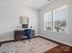 Well-lit bedroom with large windows, a work desk, and stylish decor creating a comfortable space at 1016 Hickory Pine Rd, Waxhaw, NC 28173