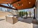 Inviting outdoor area with comfortable furniture and a beautiful wood-paneled ceiling at 1016 Hickory Pine Rd, Waxhaw, NC 28173