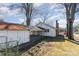 Backyard with a covered carport and partially fenced area, offering outdoor space at 106 W 16Th St, Kannapolis, NC 28081