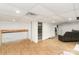 Spacious unfinished basement with drywall and flooring offering potential for customization at 106 W 16Th St, Kannapolis, NC 28081