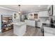 Modern kitchen boasts stainless steel appliances, light countertops, and a functional center island at 106 W 16Th St, Kannapolis, NC 28081