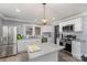 Bright kitchen featuring stainless steel appliances, granite countertops, and a center island perfect for food preparation at 106 W 16Th St, Kannapolis, NC 28081