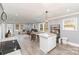 Spacious open-concept living area seamlessly connects the kitchen, dining, and living spaces for a modern lifestyle at 106 W 16Th St, Kannapolis, NC 28081