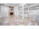 Basement area featuring a fireplace, bar, and tile floors at 109 Dabbling Duck Cir, Mooresville, NC 28117