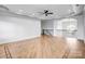 Expansive living room featuring hardwood floors, large window, and neutral walls at 109 Dabbling Duck Cir, Mooresville, NC 28117
