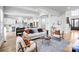 Bright and airy living space with hardwood floors, open to the kitchen, perfect for modern living and entertaining at 109 Dabbling Duck Cir, Mooresville, NC 28117